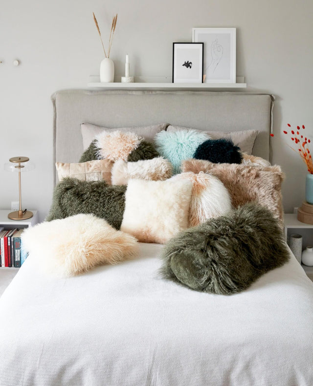 fårskinnskuddar säng - faarskinn.se