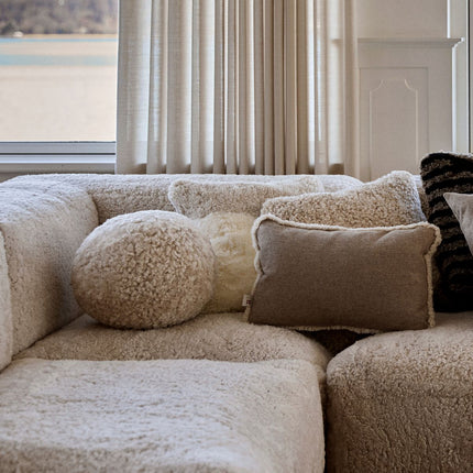 Angelite kudde | Kort lugg | Nya Zeeland | Ø25/30/35 cm Svart