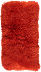Fårskinnskudde | Lång lugg | 28x56 cm Pangorange